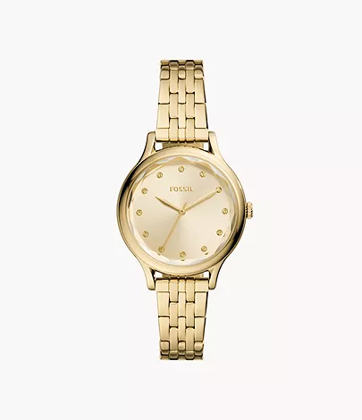 A women’s watch with a gold-tone dial and bracelet.