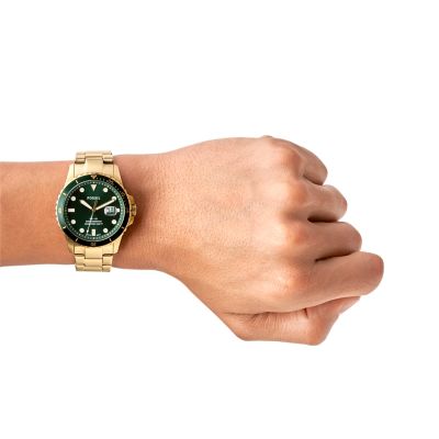 Fossil gold and online green watch