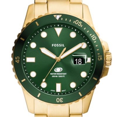 Reloj Fossil Blue Dive de acero inoxidable en tono dorado con tres agujas y fecha