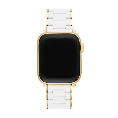 Gold apple watch with white outlet band