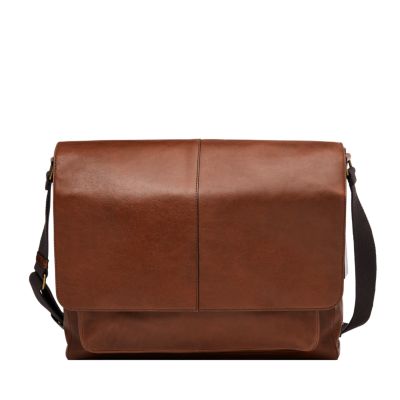 A brown leather messenger bag.