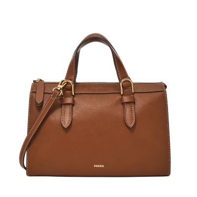 Eine Damen-Satchel aus roséfarbenem Leder mit passendem Herz-Charmanhänger.