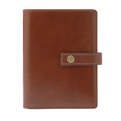 A brown leather passport case with a snap closure.